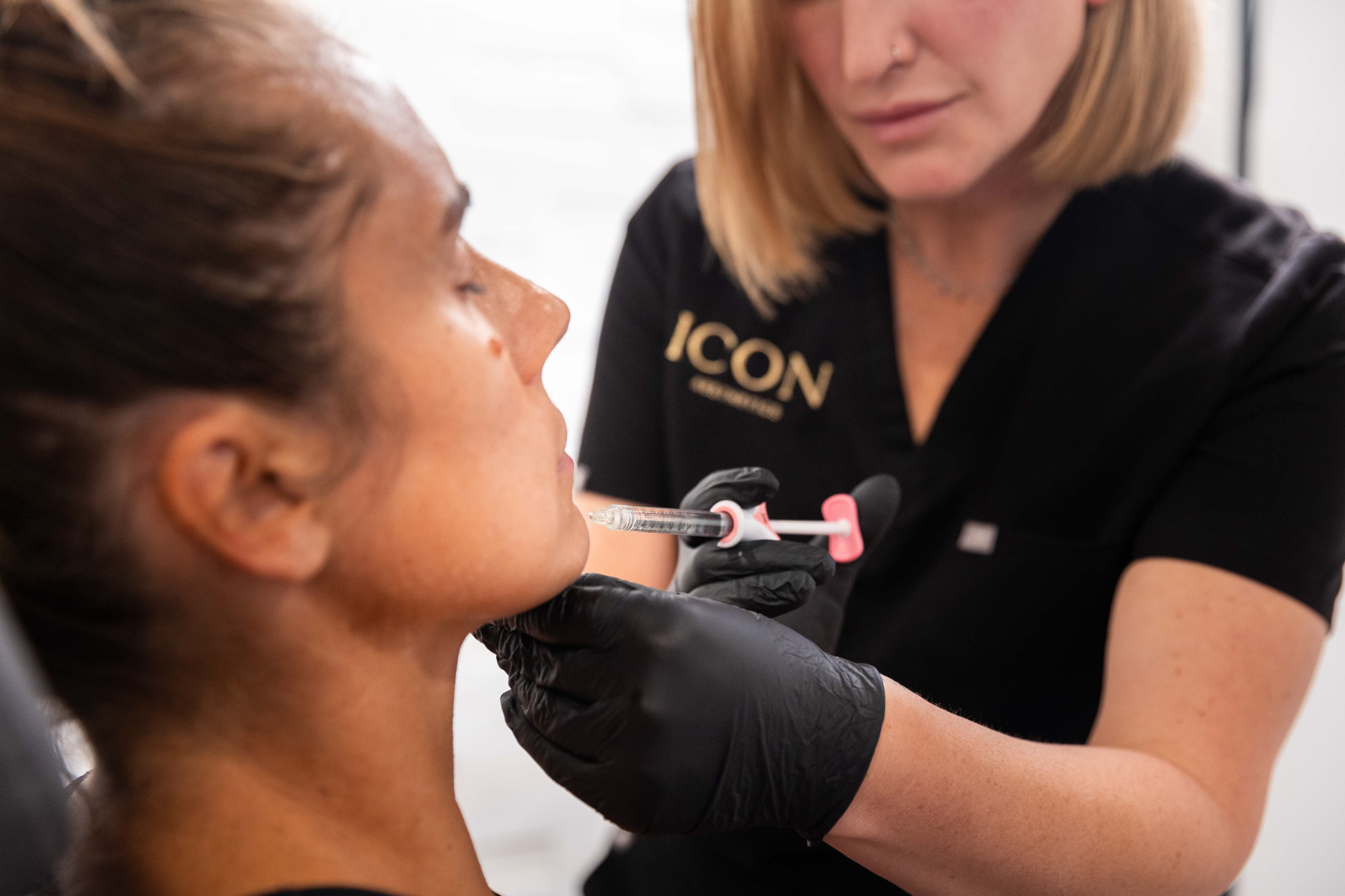 Icon Aesthetics injector performing a lip filler treatment in Valparaiso, Indiana